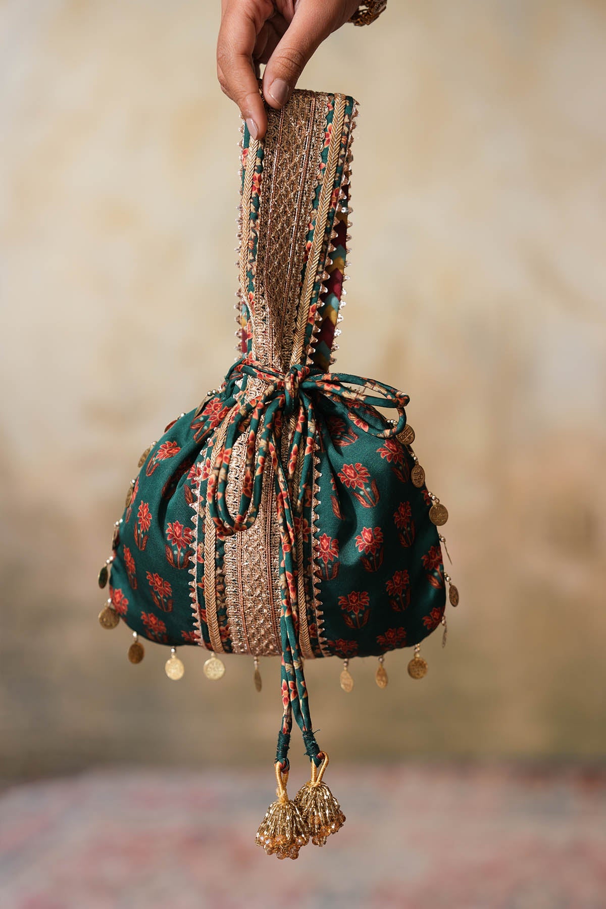 Buy Emerald Green Gota Work Potli by Ugna by Unnati for women online at ScrollnShops